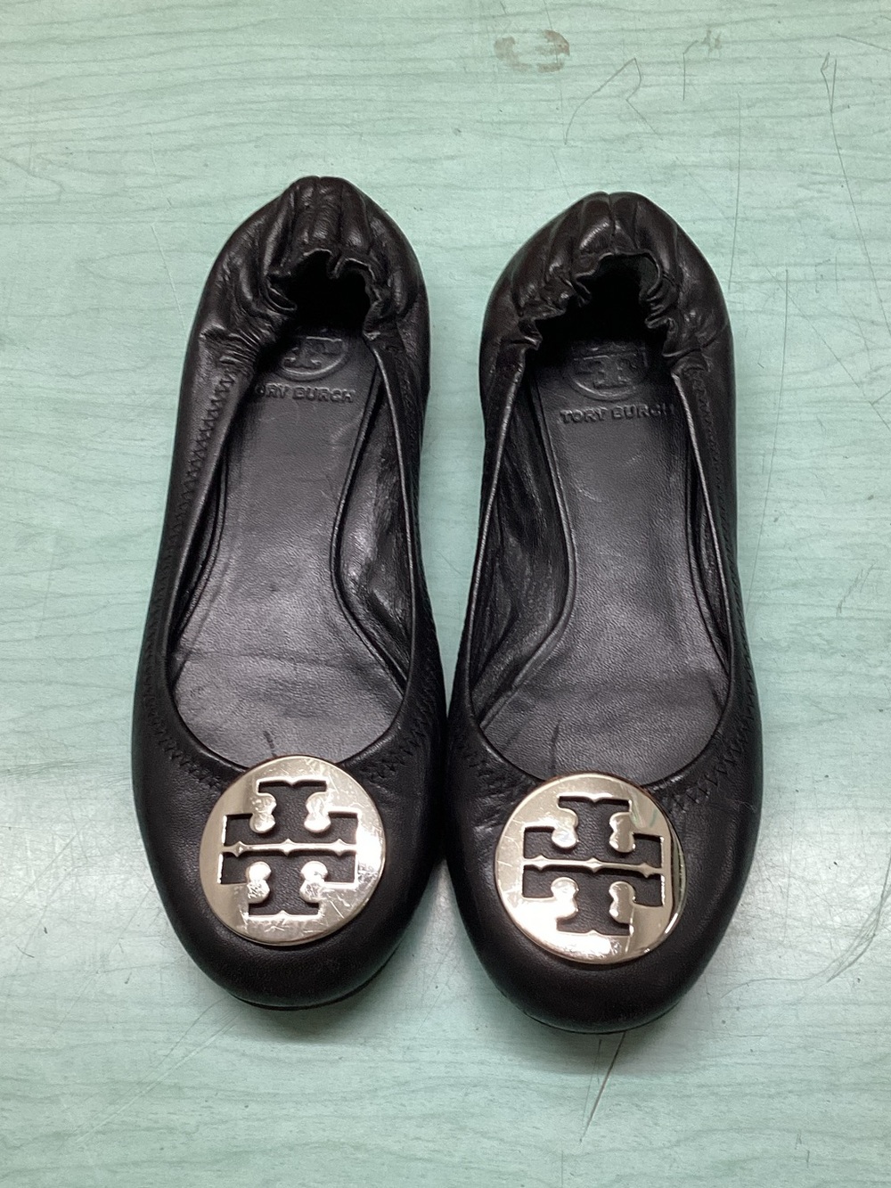 Tory Burch Black Leather Logo Ballet Flats with Silver Medallions